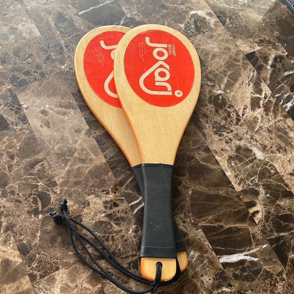 🏸